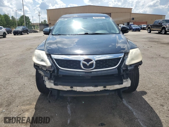 2012 Mazda CX-9 Grand Touring z VIN JM3TB2DAXC0358272, wystawiony jako Copart lot #60703665 z przebiegiem 278 558 mil mil oraz Szkoda całkowita • Salvage title. Historia ofert i sprzedaży dostępna na DreamBid. Obrazek 5.