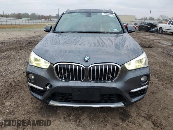 2017 BMW X1 sDrive28i with VIN WBXHU7C3XH5H38074, listed as a Copart auction lot 43088995 with 98,820 mi miles and Salvage Title. Bid and sale history available at carsss.com. Image 5.