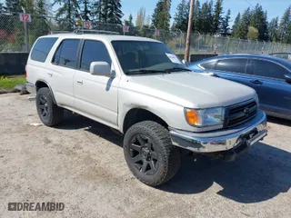 1999 Toyota 4Runner SR5 with VIN JT3GN86R0X0117581, listed as a IAAI auction lot 42045062 with 303,219 mi miles. Bid and sale history available at carsss.com. Image 1.