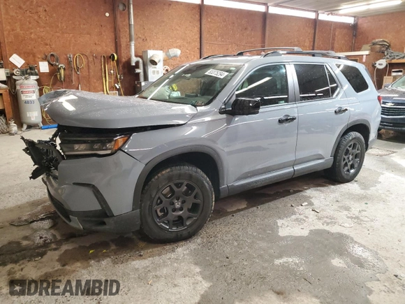 2023 Honda Pilot TrailSport with VIN 5FNYG1H6XPB009572, listed as a Copart auction lot 83375294 with 33,482 mi miles and Salvage Title. Bid and sale history available at carsss.com. Image 1.