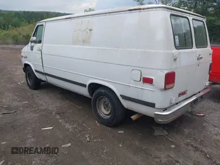 1993 GMC Vandura z VIN 1GTEG25K7PF510652, wystawiony jako IAAI lot #42097211 z przebiegiem 368 766 mil mil oraz . Historia ofert i sprzedaży dostępna na DreamBid. Obrazek 3.
