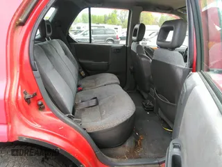 1998 Isuzu Rodeo S z VIN 4S2CK58WXW4325645, wystawiony jako IAAI lot #42013228 z przebiegiem 300 698 mil mil oraz . Historia ofert i sprzedaży dostępna na DreamBid. Obrazek 8.