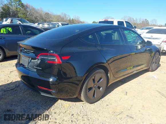 2023 Tesla Model 3 Long Range with VIN 5YJ3E1EB6PF634116, listed as a IAAI auction lot 41814670 with 47,801 mi miles and . Bid and sale history available at DreamBid. Image 4.