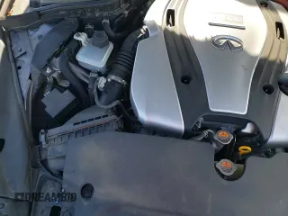 2015 Infiniti Q50 Hybrid Premium z VIN JN1AV7AR0FM850159, wystawiony jako Copart lot #84346804 z przebiegiem 113 583 mil mil oraz Szkoda całkowita • Salvage title. Historia ofert i sprzedaży dostępna na DreamBid. Obrazek 13.
