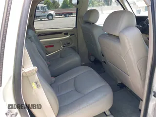 2004 Cadillac Escalade with VIN 1GYEK63N54R122875, listed as a IAAI auction lot 42736386 with 143,422 mi miles and . Bid and sale history available at DreamBid. Image 8.