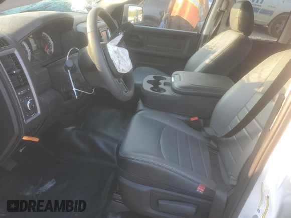 2023 Ram 1500 Express with VIN 1C6RR6FT8PS516520, listed as a Copart auction lot 69469573 with 5,159 mi miles and Salvage title. Bid and sale history available at DreamBid. Image 7.