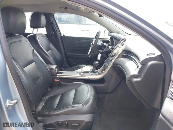 2013 Chevrolet Malibu LTZ with VIN 1G11H5SA7DU134124, listed as a IAAI auction lot 42052592 with 124,031 mi miles. Bid and sale history available at carsss.com. Image 5.