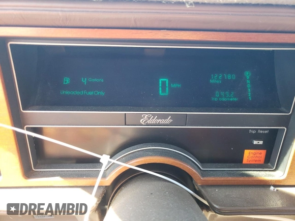 1988 Cadillac Eldorado z VIN 1G6EL115XJU611177, wystawiony jako Copart lot #46526855 z przebiegiem 122 780 mil mil oraz Szkoda całkowita • Salvage title. Historia ofert i sprzedaży dostępna na DreamBid. Obrazek 9.