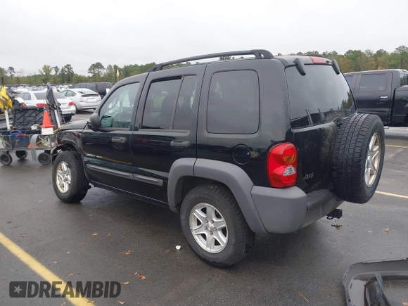 2003 Jeep Liberty Sport with VIN 1J4GK48KX3W656837, listed as a IAAI auction lot 40785615 with 164,450 mi miles and . Bid and sale history available at DreamBid. Image 3.