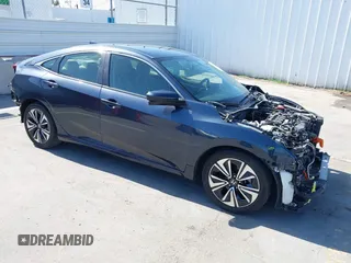 2018 Honda Civic EX-T z VIN JHMFC1F31JX031399, wystawiony jako IAAI lot #42532170 z przebiegiem 132 868 mil mil oraz . Historia ofert i sprzedaży dostępna na DreamBid. Obrazek 1.