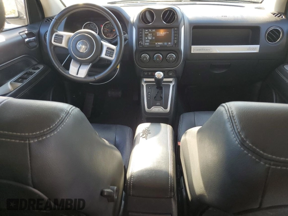 2015 Jeep Compass Latitude with VIN 1C4NJCEBXFD170737, listed as a Copart auction lot 80455634 with 186,520 mi miles and Clean Title. Bid and sale history available at carsss.com. Image 8.