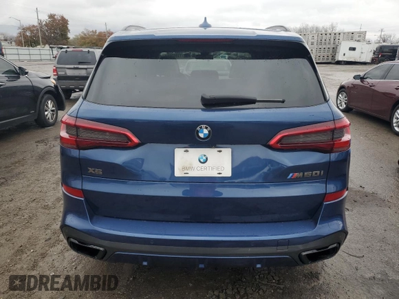 2020 BMW X5 M50i with VIN 5UXJU4C07LLE46002, listed as a Copart auction lot 77853984 with 74,098 mi miles and Salvage Title. Bid and sale history available at DreamBid. Image 6.