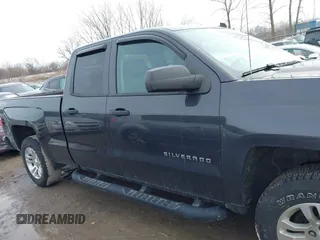 2014 Chevrolet Silverado 1500 LT with VIN 1GCVKREC2EZ149018, listed as a IAAI auction lot 41403200 with 153,760 mi miles and . Bid and sale history available at DreamBid. Image 14.