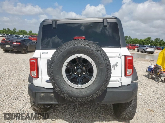 2024 Ford Bronco Big Bend with VIN 1FMDE7BH1RLA09232, listed as a Copart auction lot 61413055 with 15,590 mi miles and Salvage title. Bid and sale history available at DreamBid. Image 6.