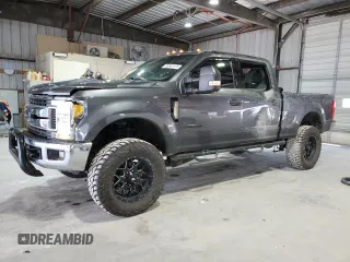 2017 Ford F-250 Lariat with VIN 1FT7W2BT6HEB28693, listed as a Copart auction lot 58661875 with 104,895 mi miles and Salvage title. Bid and sale history available at DreamBid. Image 1.