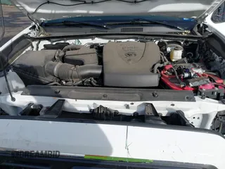 2019 Toyota Tacoma SR z VIN 3TMCZ5AN6KM284101, wystawiony jako IAAI lot #41099466 z przebiegiem 36 119 mil mil oraz . Historia ofert i sprzedaży dostępna na DreamBid. Obrazek 10.