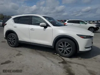 2017 Mazda CX-5 Grand Touring with VIN JM3KFBDL9H0202667, listed as a Copart auction lot 51971035 with 126,668 mi miles and Salvage Title. Bid and sale history available at carsss.com. Image 4.