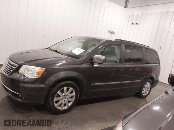 2011 Chrysler Town & Country Touring L with VIN 2A4RR8DG3BR676240, listed as a IAAI auction lot 41980939 with 184,524 mi miles and . Bid and sale history available at DreamBid. Image 14.