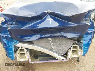 2020 Tesla Model 3 Standard Range Plus with VIN 5YJ3E1EA1LF802648, listed as a IAAI auction lot 42208034 with 27,231 mi miles and . Bid and sale history available at DreamBid. Image 6.