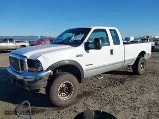 1999 Ford Super Duty F-250 XL with VIN 1FTNX21F4XED35890, listed as a IAAI auction lot 41420623 with 214,432 mi miles. Bid and sale history available at carsss.com. Image 2.