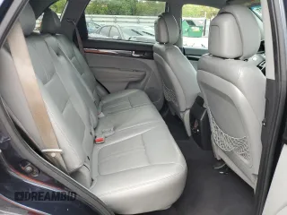 2012 Kia Sorento LX z VIN 5XYKT3A17CG274495, wystawiony jako Copart lot #56321925 z przebiegiem 130 439 mil mil oraz Szkoda całkowita • Salvage title. Historia ofert i sprzedaży dostępna na DreamBid. Obrazek 11.