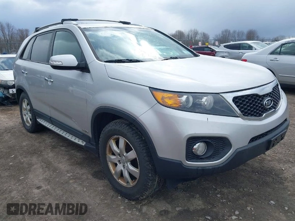 2012 Kia Sorento LX with VIN 5XYKTDA69CG280705, listed as a IAAI auction lot 42055542 with 142,770 mi miles. Bid and sale history available at carsss.com. Image 1.