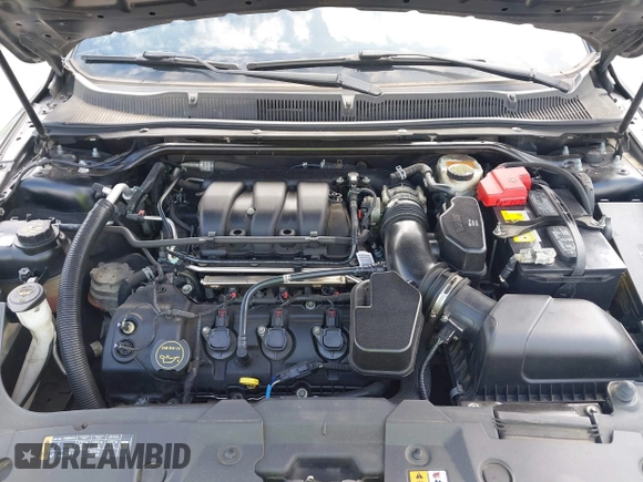 2015 Ford Taurus SEL with VIN 1FAHP2E83FG175051, listed as a IAAI auction lot 42357517 with 200,033 mi miles and . Bid and sale history available at DreamBid. Image 10.