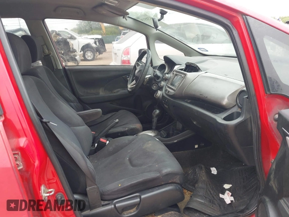 2009 Honda Fit Sport z VIN JHMGE88609S016304, wystawiony jako IAAI lot #42385175 z przebiegiem 254 317 mil mil oraz . Historia ofert i sprzedaży dostępna na DreamBid. Obrazek 5.