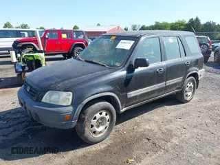 1999 Honda CR-V LX z VIN JHLRD2842XC010409, wystawiony jako IAAI lot #42402281 z przebiegiem 265 901 mil mil oraz . Historia ofert i sprzedaży dostępna na DreamBid. Obrazek 2.