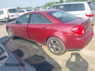 2005 Pontiac G6 GT with VIN 1G2ZH528454148009, listed as a IAAI auction lot 42415436 with 195,408 mi miles and . Bid and sale history available at DreamBid. Image 3.