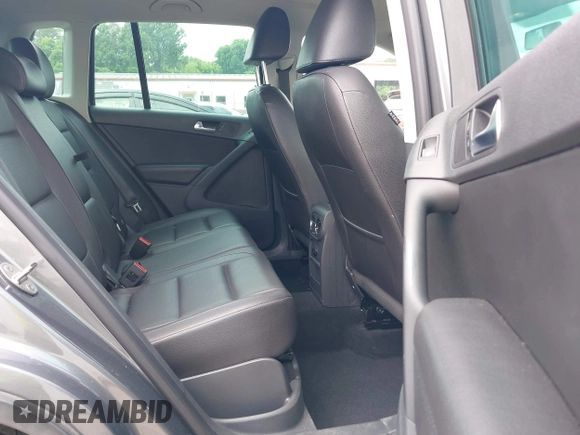 2012 Volkswagen Tiguan SEL with VIN WVGAV7AX8CW005146, listed as a IAAI auction lot 42126959 with 134,005 mi miles and . Bid and sale history available at DreamBid. Image 8.
