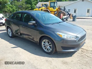 2015 Ford Focus SE with VIN 1FADP3F25FL300945, listed as a IAAI auction lot 42483699 with 76,992 mi miles and . Bid and sale history available at DreamBid. Image 1.