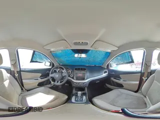 2014 Dodge Journey American Value with VIN 3C4PDCAB3ET216889, listed as a Copart auction lot 60874265 with 117,508 mi miles and Salvage title. Bid and sale history available at DreamBid. Image 16.