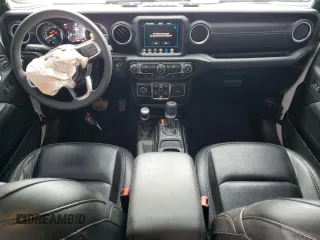 2023 Jeep Wrangler Sahara with VIN 1C4JJXP63PW536694, listed as a Copart auction lot 63409845 with 32,560 mi miles and Salvage title. Bid and sale history available at DreamBid. Image 8.