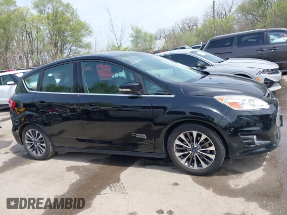 2017 Ford C-Max Energi Titanium with VIN 1FADP5FU2HL115199, listed as a IAAI auction lot 42001944 with 57,609 mi miles. Bid and sale history available at carsss.com. Image 13.