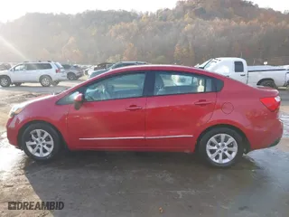 2015 Kia Rio LX with VIN KNADM4A30F6443225, listed as a IAAI auction lot 40705431 with 141,698 mi miles. Bid and sale history available at carsss.com. Image 14.