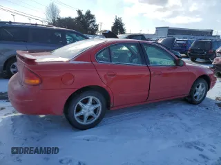 2000 Oldsmobile Alero GLS z VIN 1G3NF52E0YC317362, wystawiony jako Copart lot #48044785 z przebiegiem 169 718 mil mil oraz Szkody całkowita. Historia ofert i sprzedaży dostępna na DreamBid. Obrazek 3.