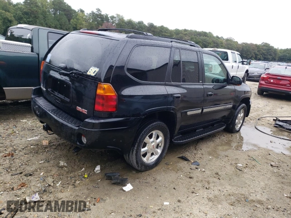 2004 GMC Envoy SLT with VIN 1GKDT13S942279670, listed as a Copart auction lot 73527974 with 120,425 mi miles and Salvage Title. Bid and sale history available at DreamBid. Image 3.