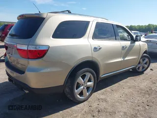 2011 Dodge Durango Citadel with VIN 1D4RE5GG3BC599473, listed as a IAAI auction lot 42216934 with 151,418 mi miles and . Bid and sale history available at DreamBid. Image 4.
