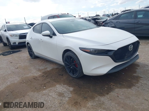 2021 Mazda 3 Premium with VIN JM1BPAML0M1302385, listed as a IAAI auction lot 41397521 with 55,907 mi miles and . Bid and sale history available at DreamBid. Image 1.