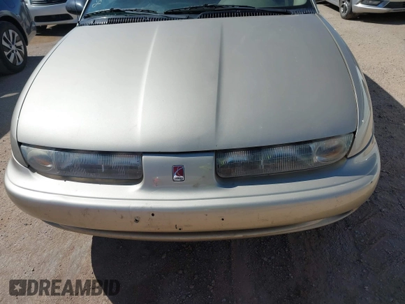 1998 Saturn SL z VIN 1G8ZK5271WZ129808, wystawiony jako IAAI lot #41993909 z przebiegiem 172 551 mil mil oraz . Historia ofert i sprzedaży dostępna na DreamBid. Obrazek 6.
