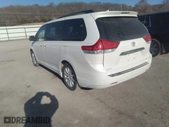 2014 Toyota Sienna XLE with VIN 5TDYK3DC3ES491381, listed as a IAAI auction lot 41803362 with 253,940 mi miles. Bid and sale history available at carsss.com. Image 3.