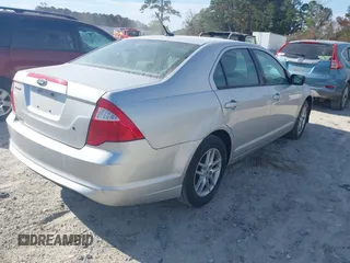 2012 Ford Fusion S with VIN 3FAHP0GA0CR315999, listed as a IAAI auction lot 40937858 with 164,719 mi miles. Bid and sale history available at carsss.com. Image 4.