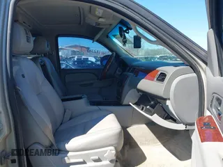 2014 Chevrolet Suburban LT with VIN 1GNSCJE07ER120130, listed as a IAAI auction lot 41792310 with 238,313 mi miles. Bid and sale history available at carsss.com. Image 5.