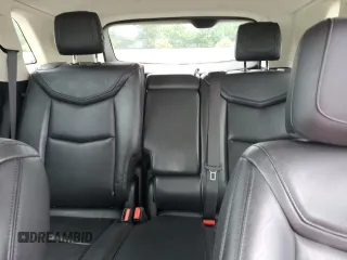 2019 Cadillac XT5 Luxury FWD с VIN 1GYKNCRS7KZ104400, выставлен на аукционе Copart как лот 58704715 с пробегом 80 676 миль миль и Списание • Salvage title. История ставок и продаж доступна на DreamBid. Изображение 10.