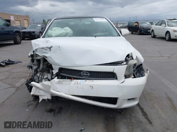 2007 Scion tC Spec z VIN JTKDE177370191749, wystawiony jako IAAI lot #42131564 z przebiegiem 174 556 mil mil oraz . Historia ofert i sprzedaży dostępna na DreamBid. Obrazek 13.
