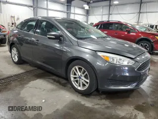 2017 Ford Focus SE with VIN 1FADP3F21HL205754, listed as a Copart auction lot 63632985 with 96,797 mi miles and Salvage title. Bid and sale history available at DreamBid. Image 4.