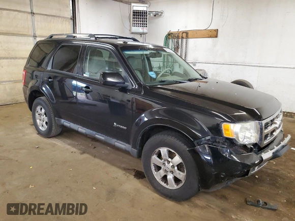 2010 Ford Escape Hybrid with VIN 1FMCU4K30AKC25228, listed as a Copart auction lot 60322835 with 207,629 mi miles and Salvage title. Bid and sale history available at DreamBid. Image 4.
