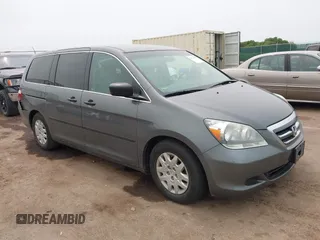2007 Honda Odyssey LX with VIN 5FNRL38207B116476, listed as a IAAI auction lot 42397091 with 161,842 mi miles and . Bid and sale history available at DreamBid. Image 1.