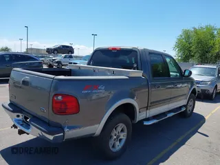 2003 Ford F-150 XLT with VIN 1FTRW08L63KD17116, listed as a IAAI auction lot 42811062 with Not provided miles and . Bid and sale history available at DreamBid. Image 4.